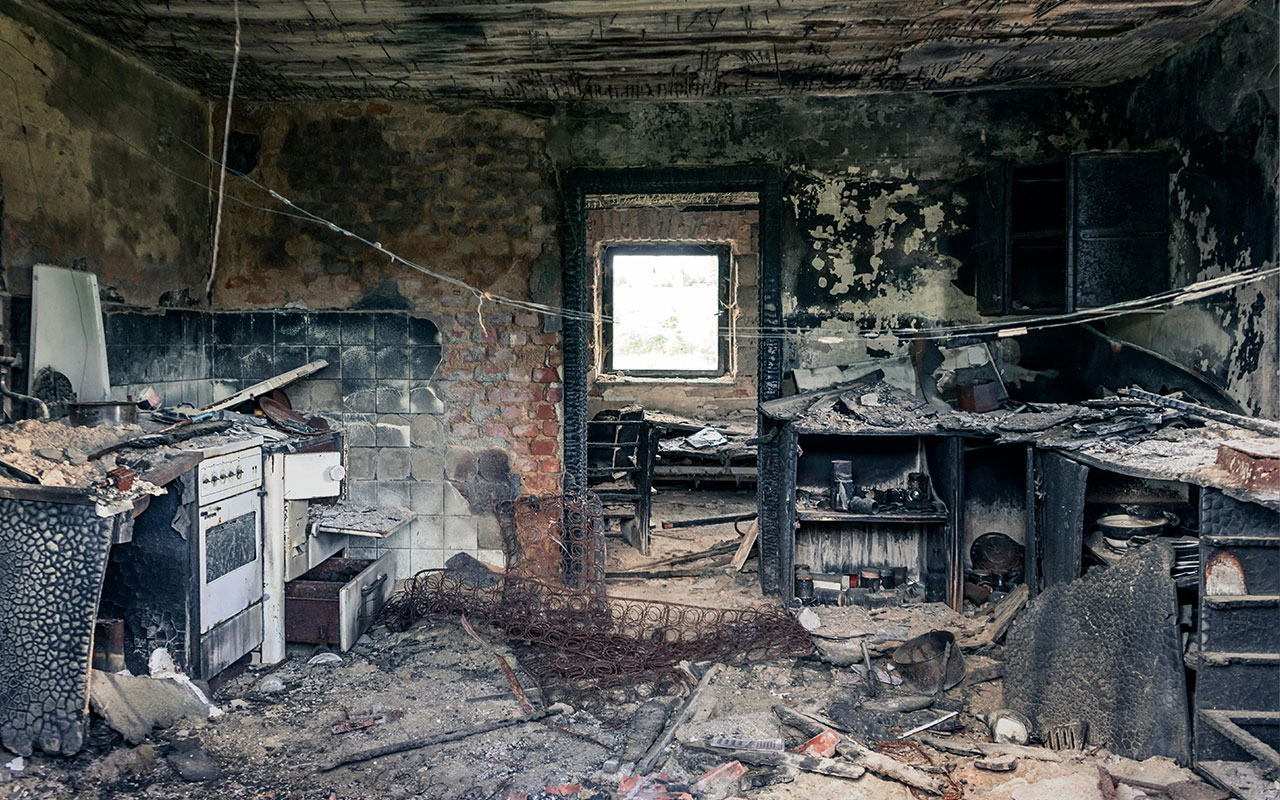 The remains of a burned-down house